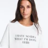 T-shirt larga de manga curta em mistura de algodão com slogan T-shirt larga de manga curta em mistura de algodão com slogan