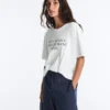 T-shirt larga de manga curta em mistura de algodão com slogan T-shirt larga de manga curta em mistura de algodão com slogan