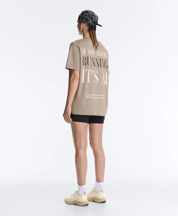 T-shirt larga de manga curta em mistura de algodão com slogan T-shirt larga de manga curta em mistura de algodão com slogan