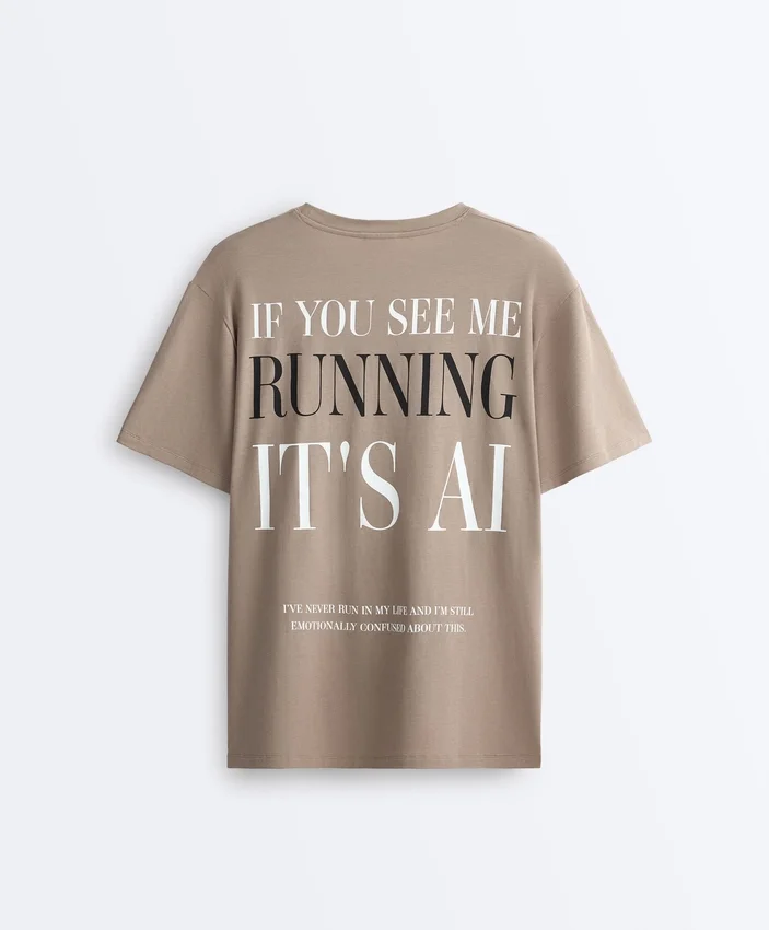 T-shirt larga de manga curta em mistura de algodão com slogan T-shirt larga de manga curta em mistura de algodão com slogan