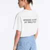 T-shirt larga em mistura de algodão com slogan T-shirt larga em mistura de algodão com slogan