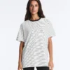 T-shirt oversize de manga curta em mistura de algodão com riscas contrastantes T-shirt oversize de manga curta em mistura de algodão com riscas contrastantes