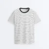 T-shirt oversize de manga curta em mistura de algodão com riscas contrastantes T-shirt oversize de manga curta em mistura de algodão com riscas contrastantes