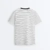 T-shirt oversize de manga curta em mistura de algodão com riscas contrastantes T-shirt oversize de manga curta em mistura de algodão com riscas contrastantes