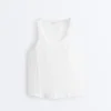 T-shirts sem costuras, sem mangas e com franzido T-shirts sem costuras, sem mangas e com franzido