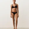 Top de biquíni com laço nas costas e decote halter em piqué Top de biquíni com laço nas costas e decote halter em piqué