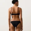Top de biquíni com laço nas costas e decote halter em piqué Top de biquíni com laço nas costas e decote halter em piqué