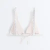 Top de biquíni triangular com alças halter e textura às riscas Top de biquíni triangular com alças halter e textura às riscas