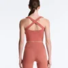 Tops Comfortlux sem mangas com corte cruzado Tops Comfortlux sem mangas com corte cruzado
