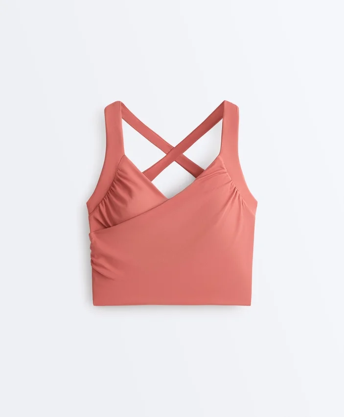 Tops Comfortlux sem mangas com corte cruzado Tops Comfortlux sem mangas com corte cruzado