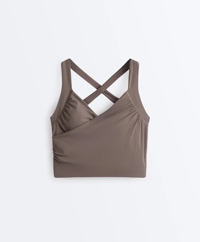 Tops Comfortlux sem mangas com corte cruzado Tops Comfortlux sem mangas com corte cruzado