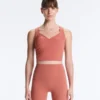 Tops Comfortlux sem mangas com corte cruzado Tops Comfortlux sem mangas com corte cruzado