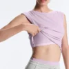 Tops sem mangas de calções em malha canelada com mistura de modal e detalhe ondulado Tops sem mangas de calções em malha canelada com mistura de modal e detalhe ondulado